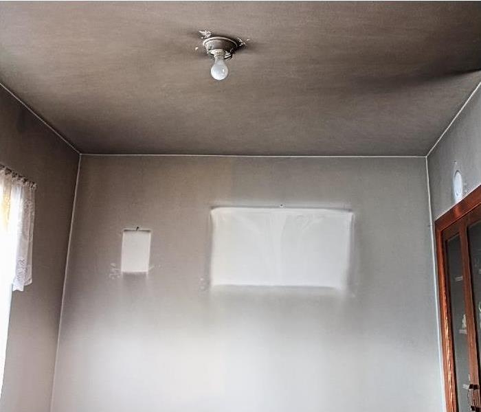 smoke damage on wall and ceiling