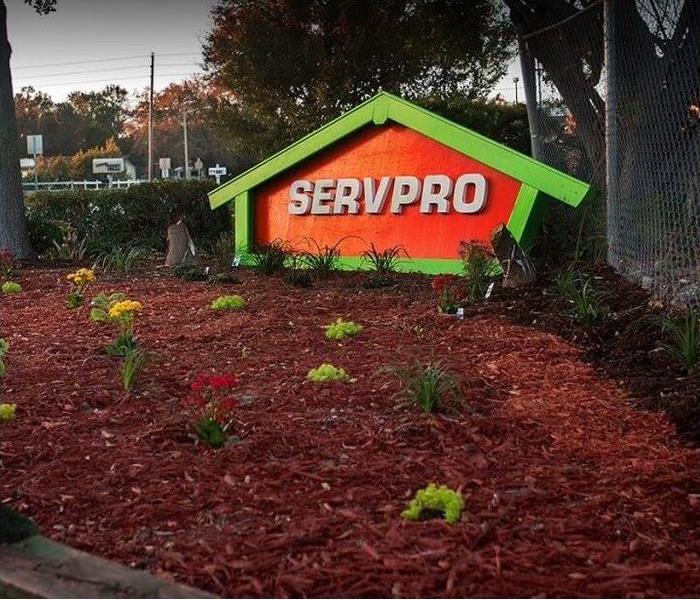 SERVPRO sign in landscaped garden